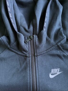 Woman’s Nike Black Zip-Up Hoodie with Subtle Swoosh
